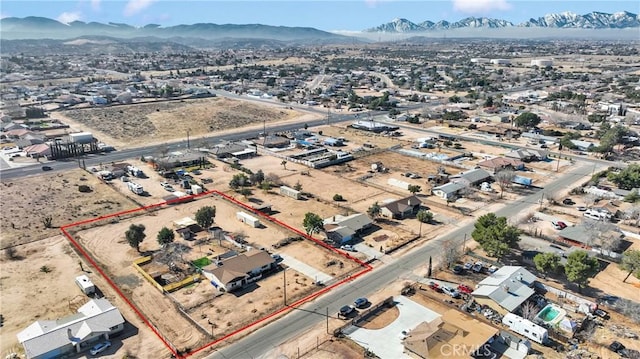 drone / aerial view featuring a mountain view