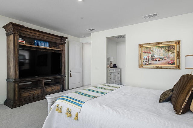 bedroom featuring light colored carpet