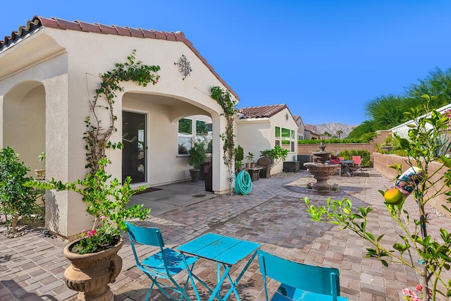 view of patio with a mountain view