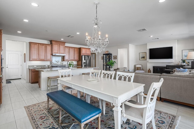 dining room featuring a notable chandelier