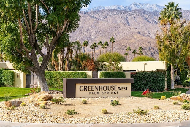 community sign featuring a mountain view