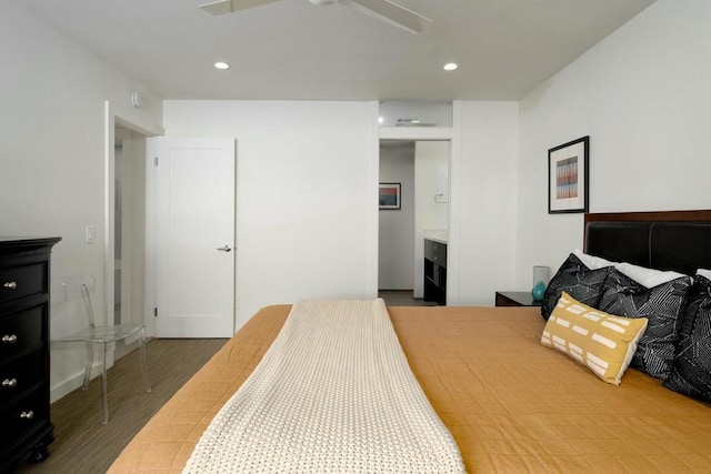 bedroom with wood-type flooring and ceiling fan