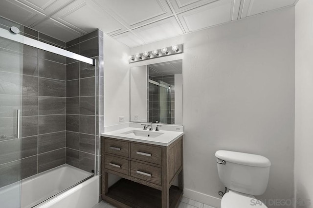 full bathroom featuring vanity, toilet, and combined bath / shower with glass door