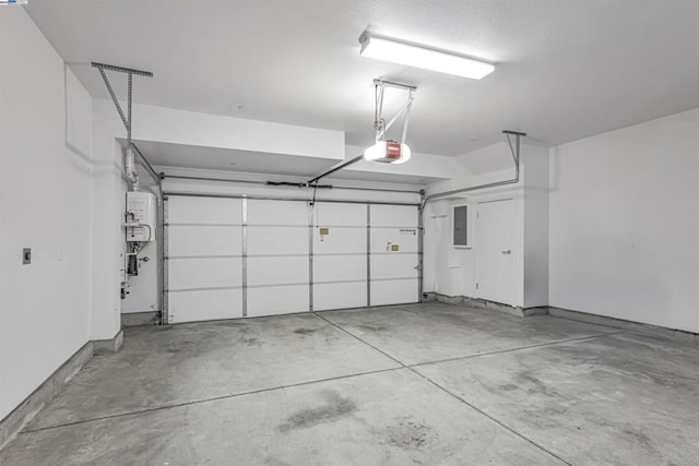 garage with a garage door opener, electric panel, and water heater