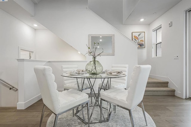 dining space featuring hardwood / wood-style flooring