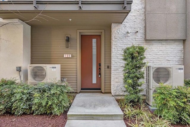 property entrance featuring ac unit