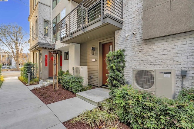 entrance to property featuring ac unit