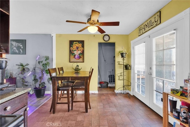 dining area featuring ceiling fan