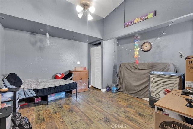 bedroom with wood-type flooring