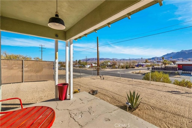 view of patio featuring a mountain view