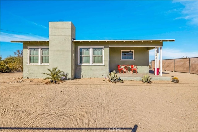 view of front of property with a patio area