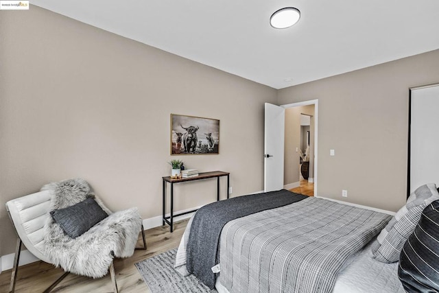 bedroom featuring light hardwood / wood-style floors