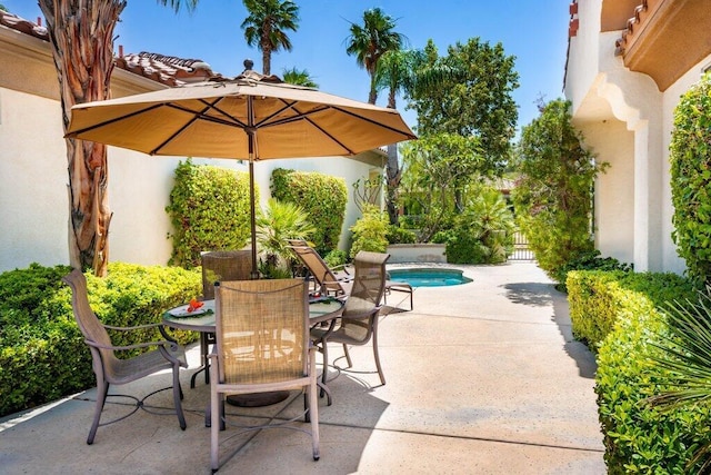 view of patio with a pool