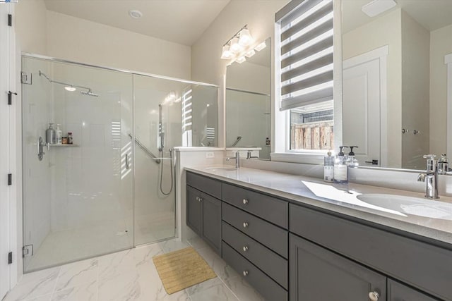 bathroom with an enclosed shower and vanity