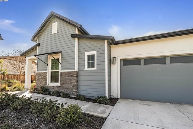 view of home's exterior with a garage