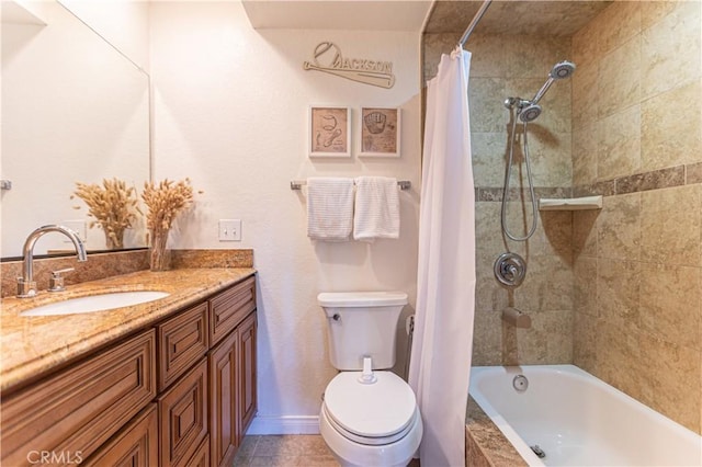 full bathroom with vanity, tile patterned floors, toilet, and shower / bath combo