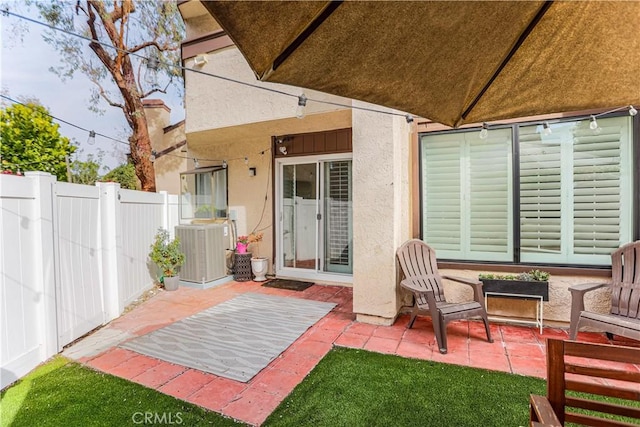 view of patio with cooling unit