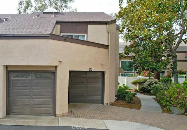 exterior space with a garage