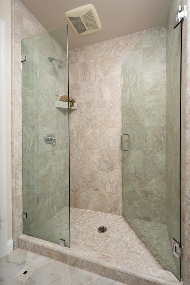 bathroom with an enclosed shower