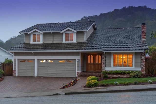 front facade with a garage