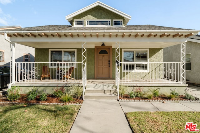 view of front of house with covered porch