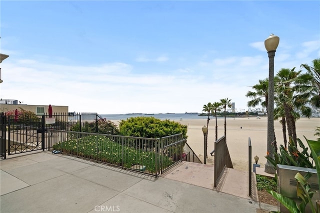 view of patio featuring a water view