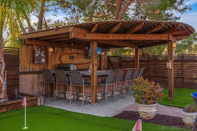 view of patio / terrace featuring a bar