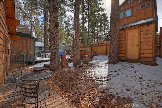 exterior space with a hot tub