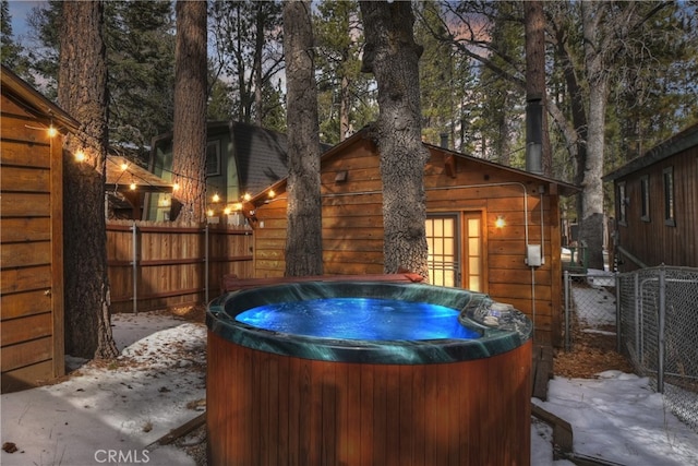 exterior space featuring a hot tub