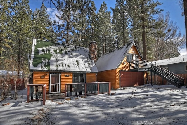 cabin featuring a wooden deck