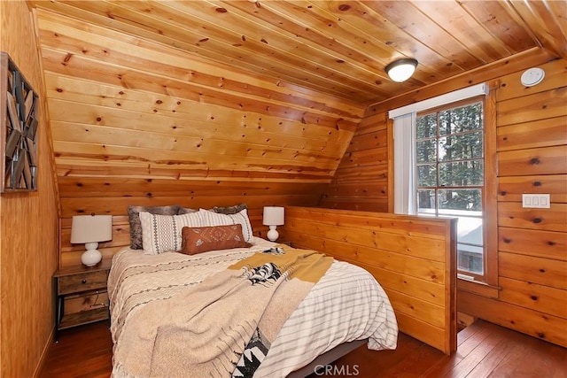 bedroom featuring vaulted ceiling, dark hardwood / wood-style floors, wooden ceiling, and wooden walls