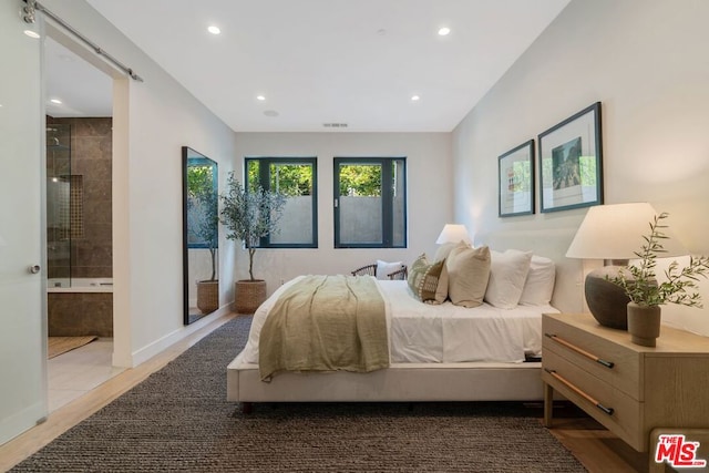 bedroom with ensuite bath