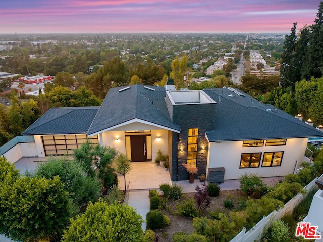 view of front of property featuring a patio