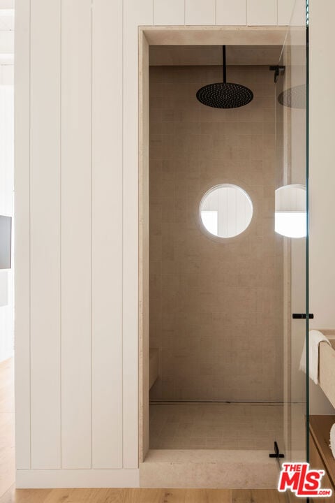 interior space featuring a tile shower