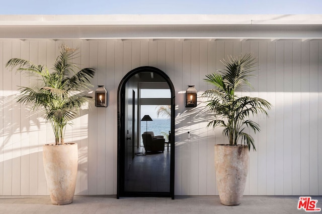 property entrance with a water view