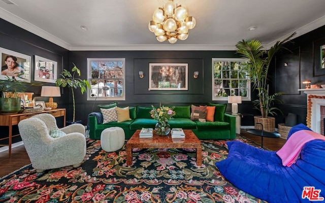 living room featuring an inviting chandelier, ornamental molding, and hardwood / wood-style floors