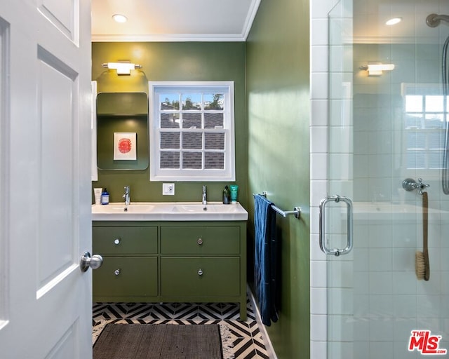 bathroom with vanity, ornamental molding, and walk in shower