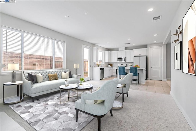 living room featuring light tile patterned floors