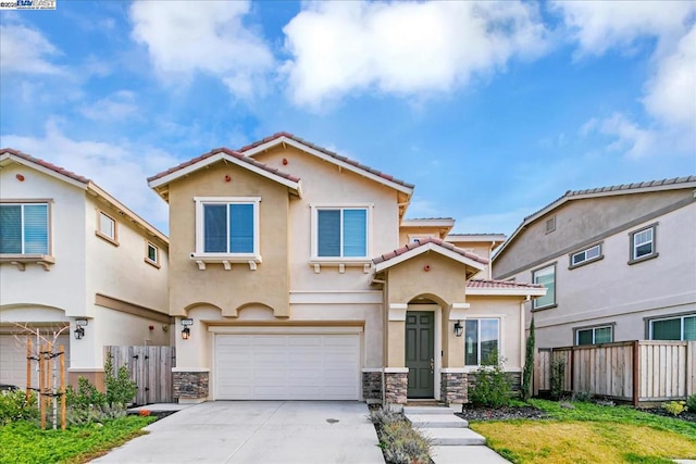 view of front of property with a garage