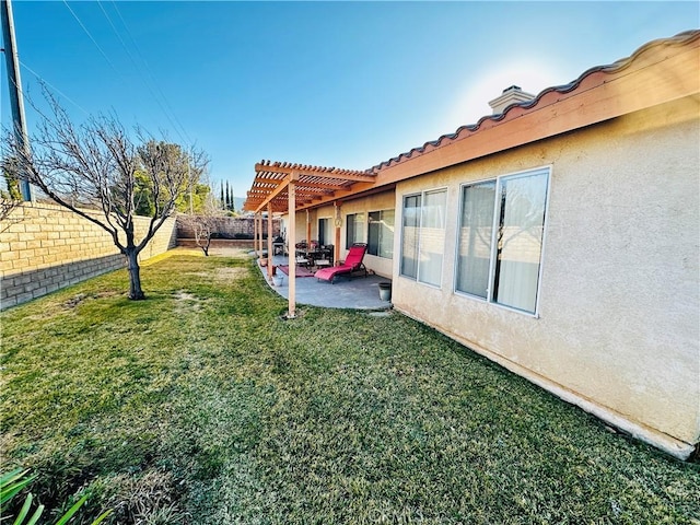 view of yard featuring a patio area and a pergola