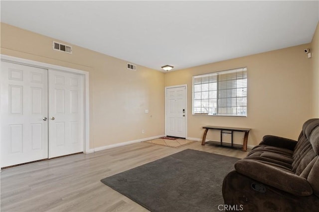 living room featuring light wood-type flooring