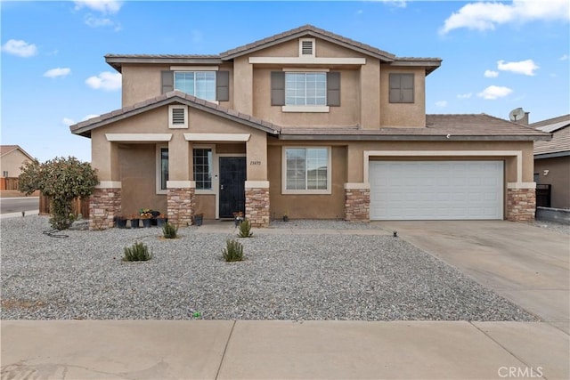 13470 Fern Pine St, Victorville, CA 92392 - view of front facade featuring a garage