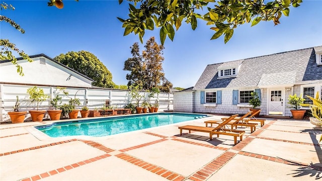 view of pool featuring a patio area