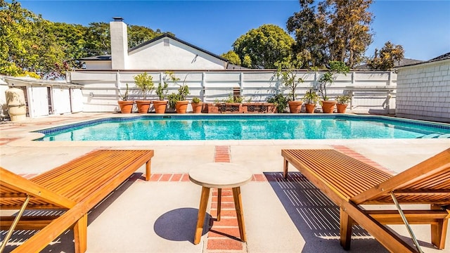 view of pool with a patio