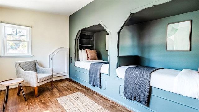 bedroom featuring hardwood / wood-style floors