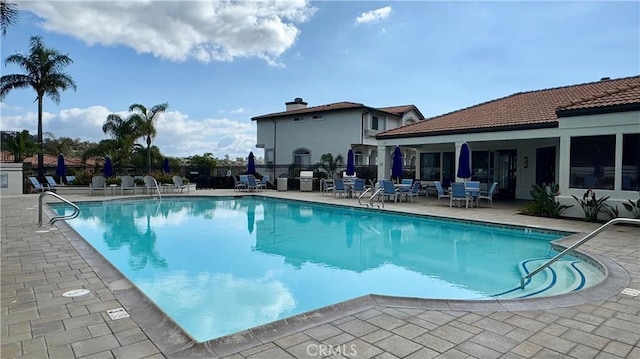 view of pool with a patio