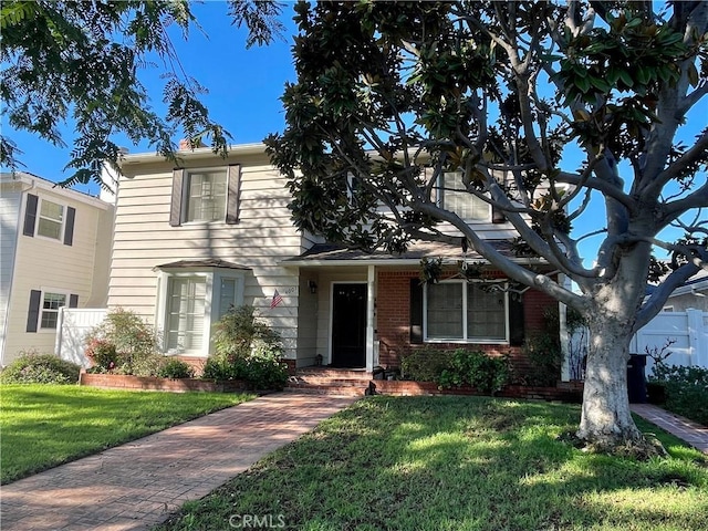 view of front of house with a front lawn