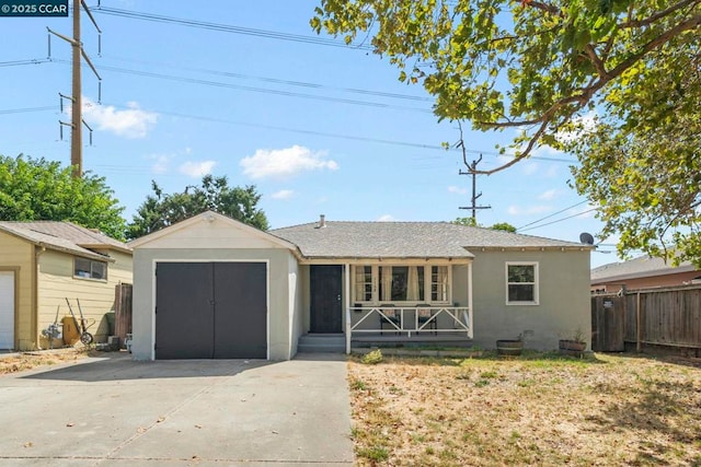 single story home with a shed