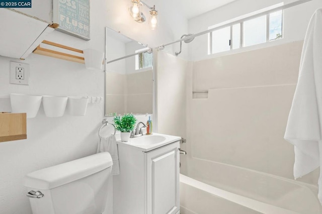 full bathroom featuring vanity, shower / bathing tub combination, and toilet