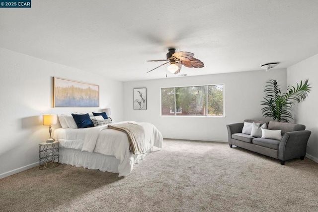 bedroom with ceiling fan and carpet flooring